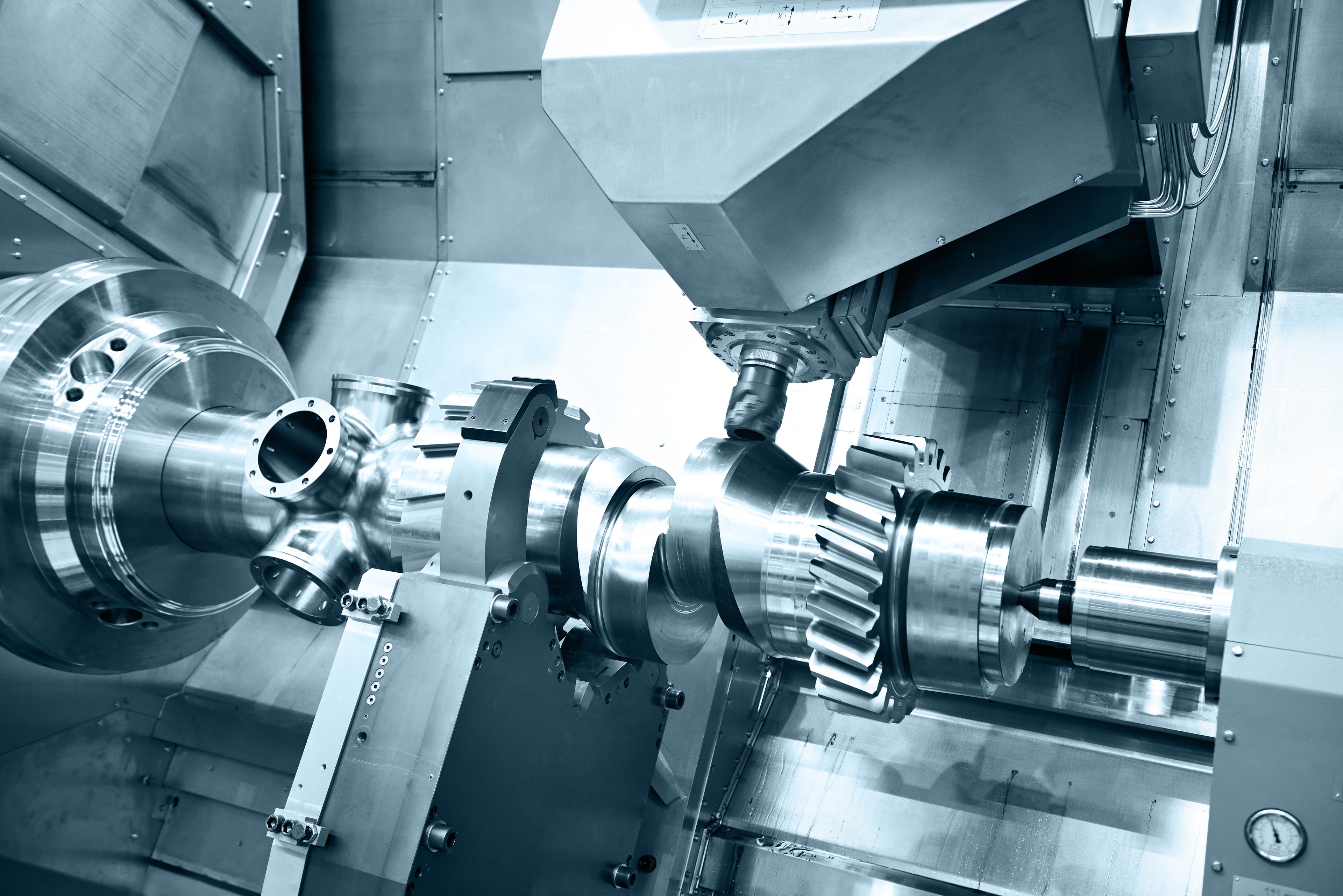 CNC mill-turn machining process combining milling and turning operations in a single setup for precision metal components