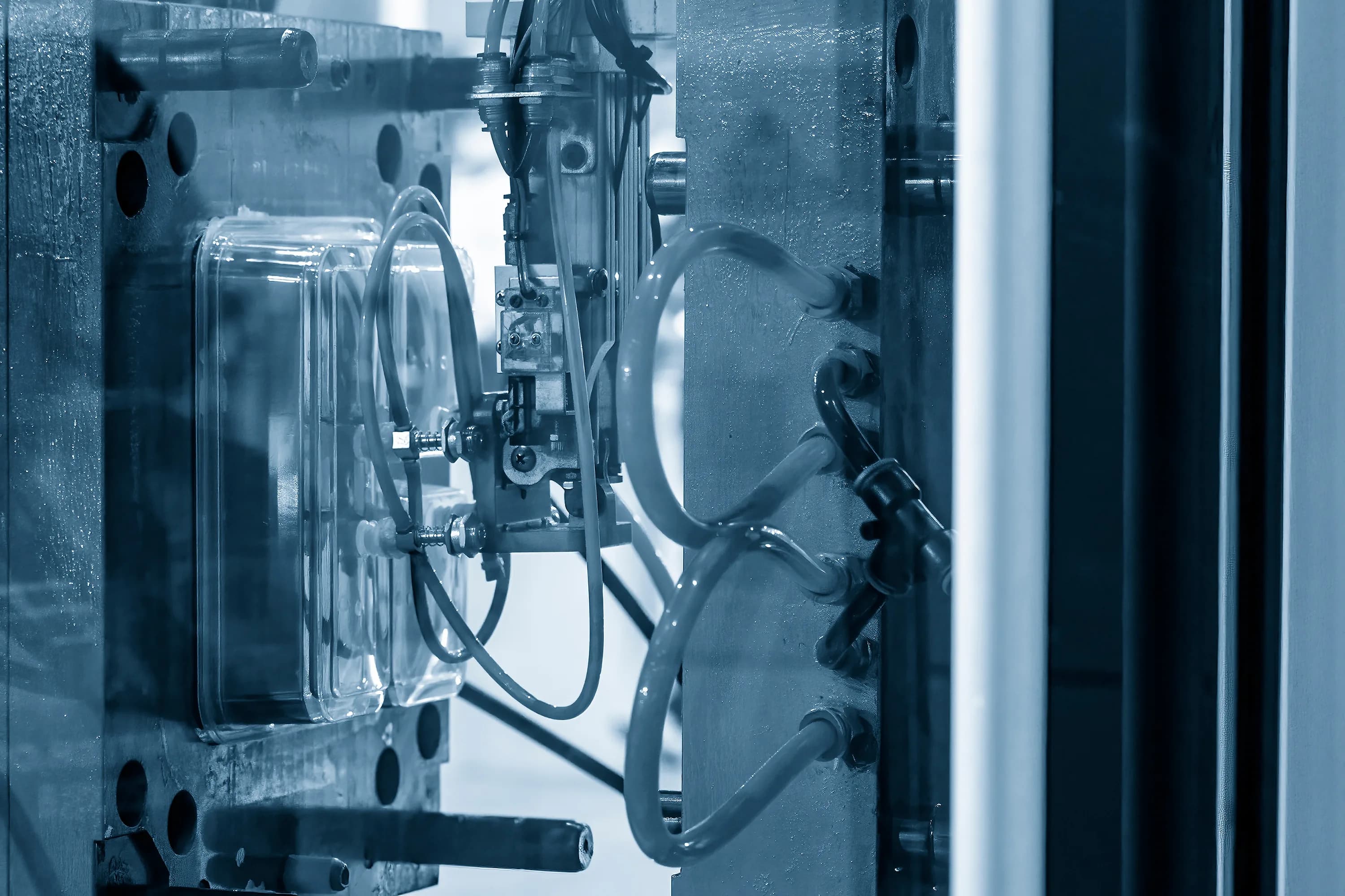 Plastic injection molding process producing precision engineered components