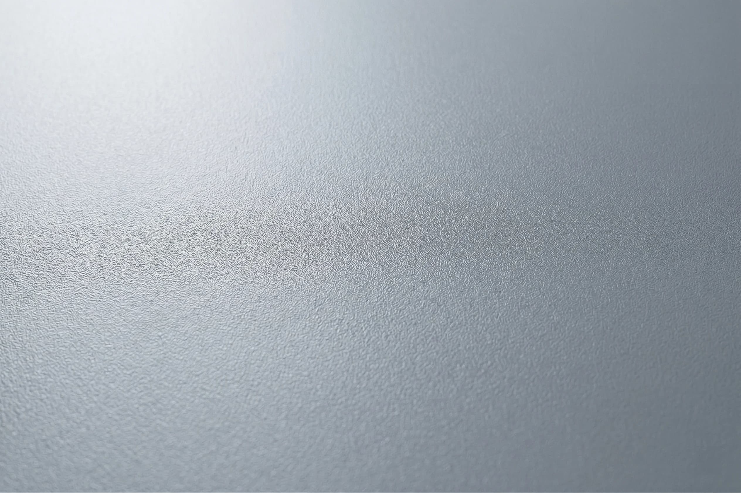 Textured plastic molded component