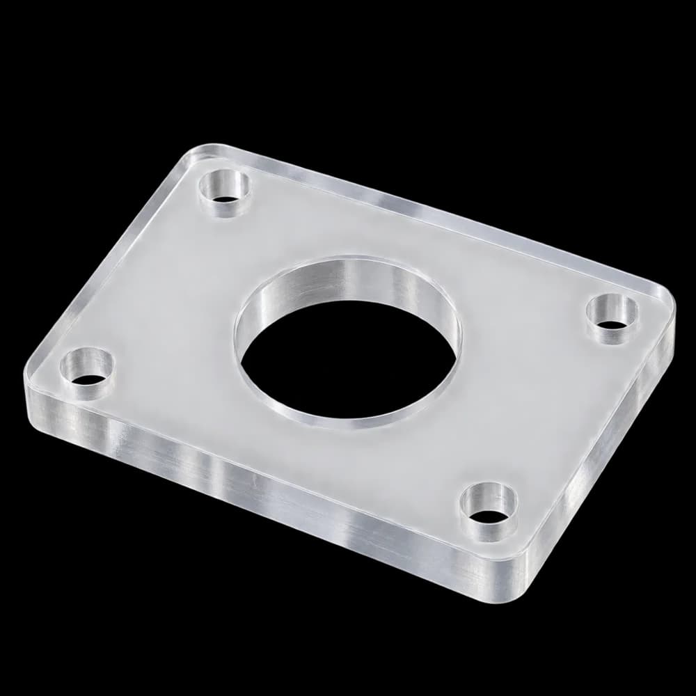 CNC milled clear acrylic adapter plate with a center bore and four mounting holes